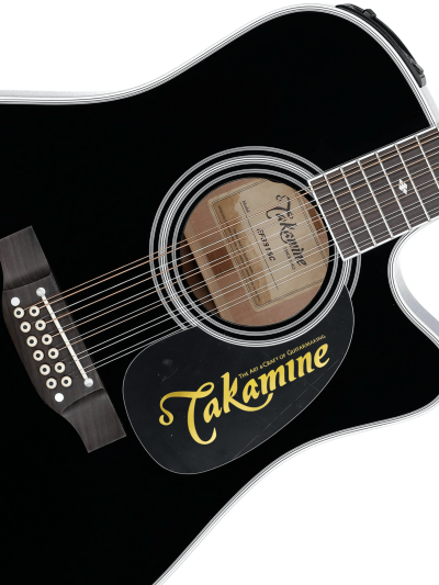 Sticker takamine dorado en guitarra